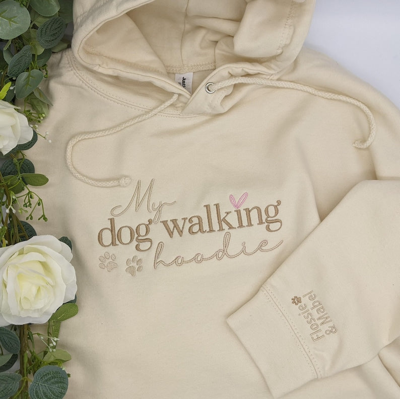 Custom embroidered dog walking hoodie with names on sleeve