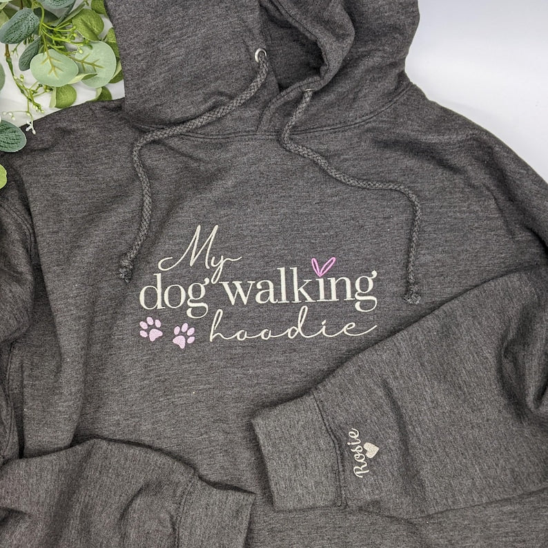 Custom embroidered dog walking hoodie with names on sleeve