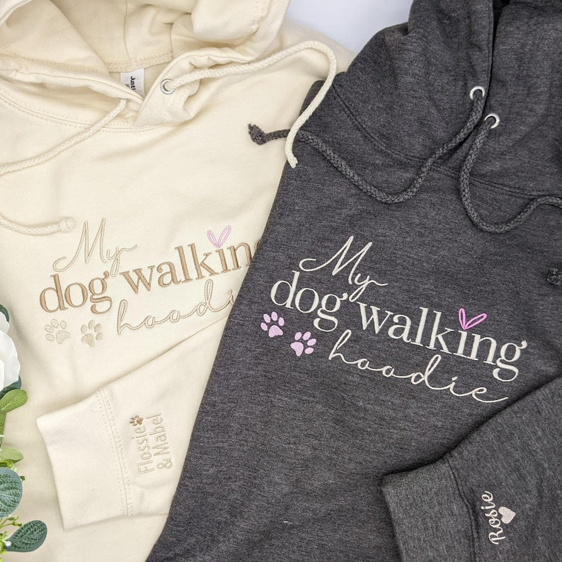 Custom embroidered dog walking hoodie with names on sleeve